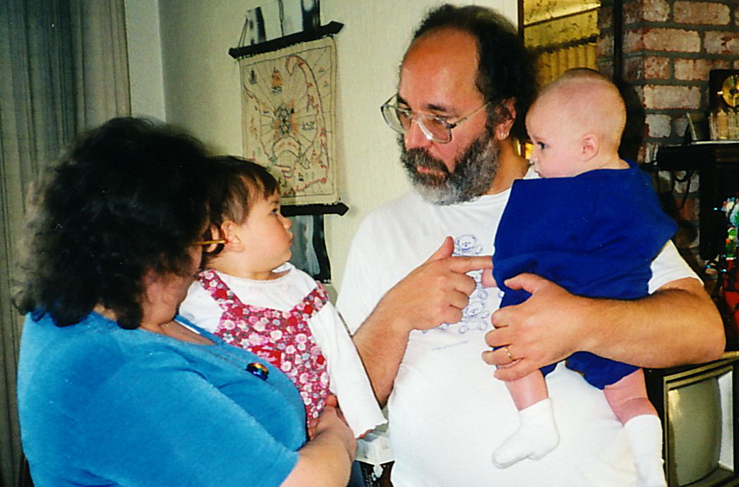 Joanne holding Josephine, Neil holding Cameron (2000)
